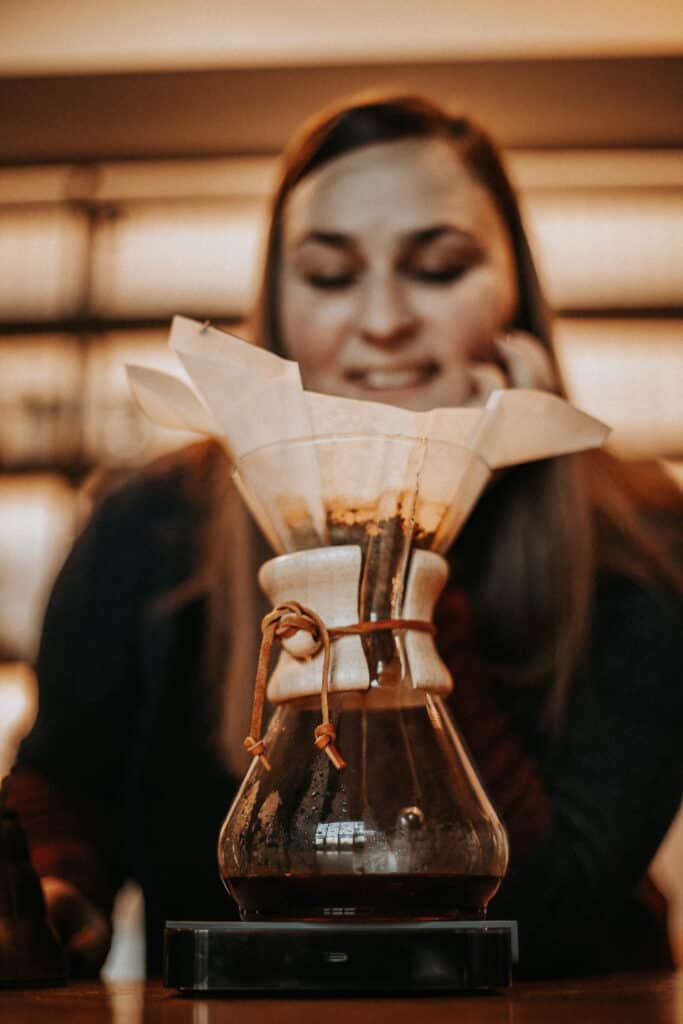 Joanna brewing chemex at the bar